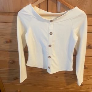 Ribbed cream shirt.